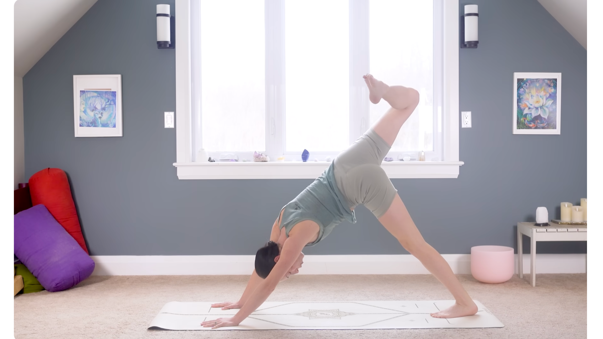 Woman practicing 15-minute morning yoga for flexibility in Three-Legged Dog